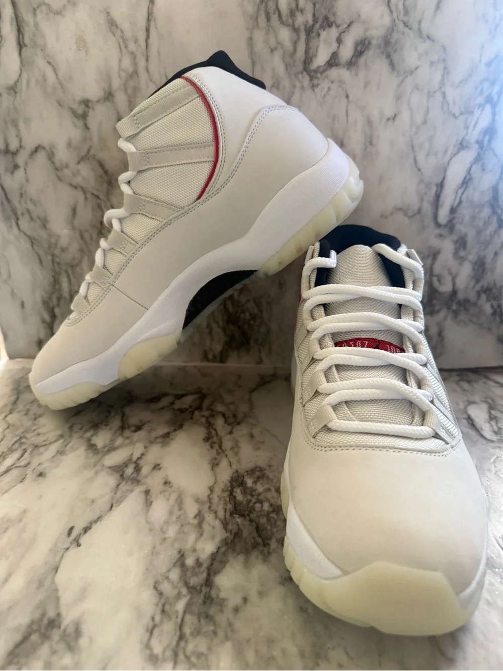 NEW Air Jordan 11 Retro in Platinum Tint and University Red